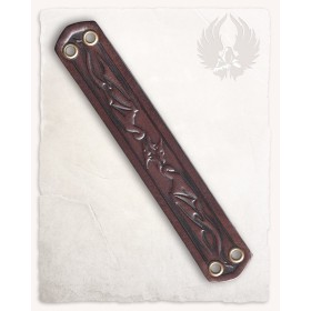 Un bracelet en cuir avec un dragon