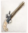 Pistolet de pirate de type flintlock en metal avec crosse en imitation ivoire