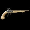 Pistolet de type flintlock en metal avec crosse en ivoire