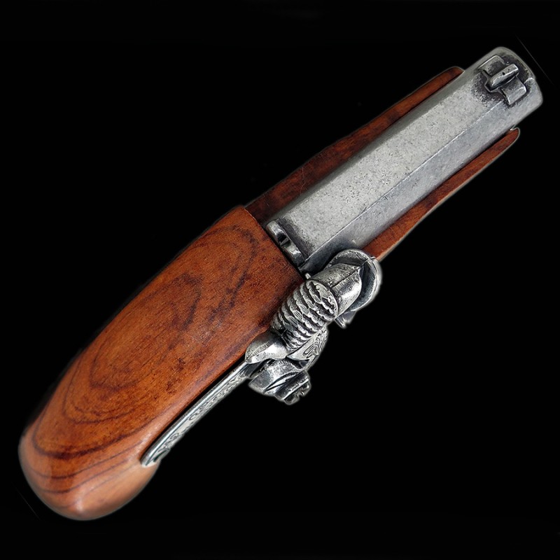 Pistolet Derringer de type flintlock en metal avec crosse en bois